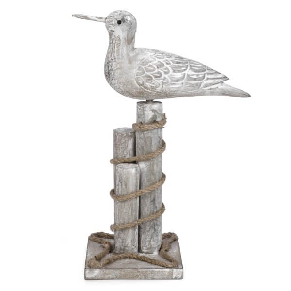Oiseau blanc sur poteau